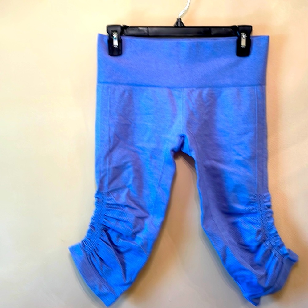 Lululemon pre loved Capri leggings in light blue.